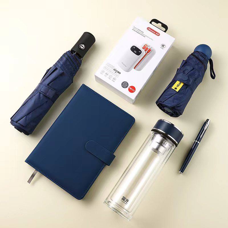 Indigo executive notebook with glass thermos, pen, power bank and umbrella