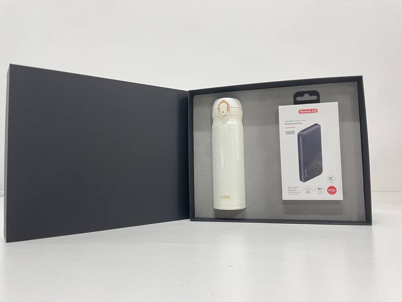 Insulated bottle and handheld fan in ivory presentation box
